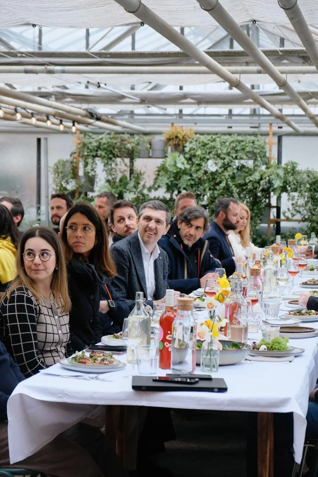 The leadership team seated together at the farm-to-table lunch